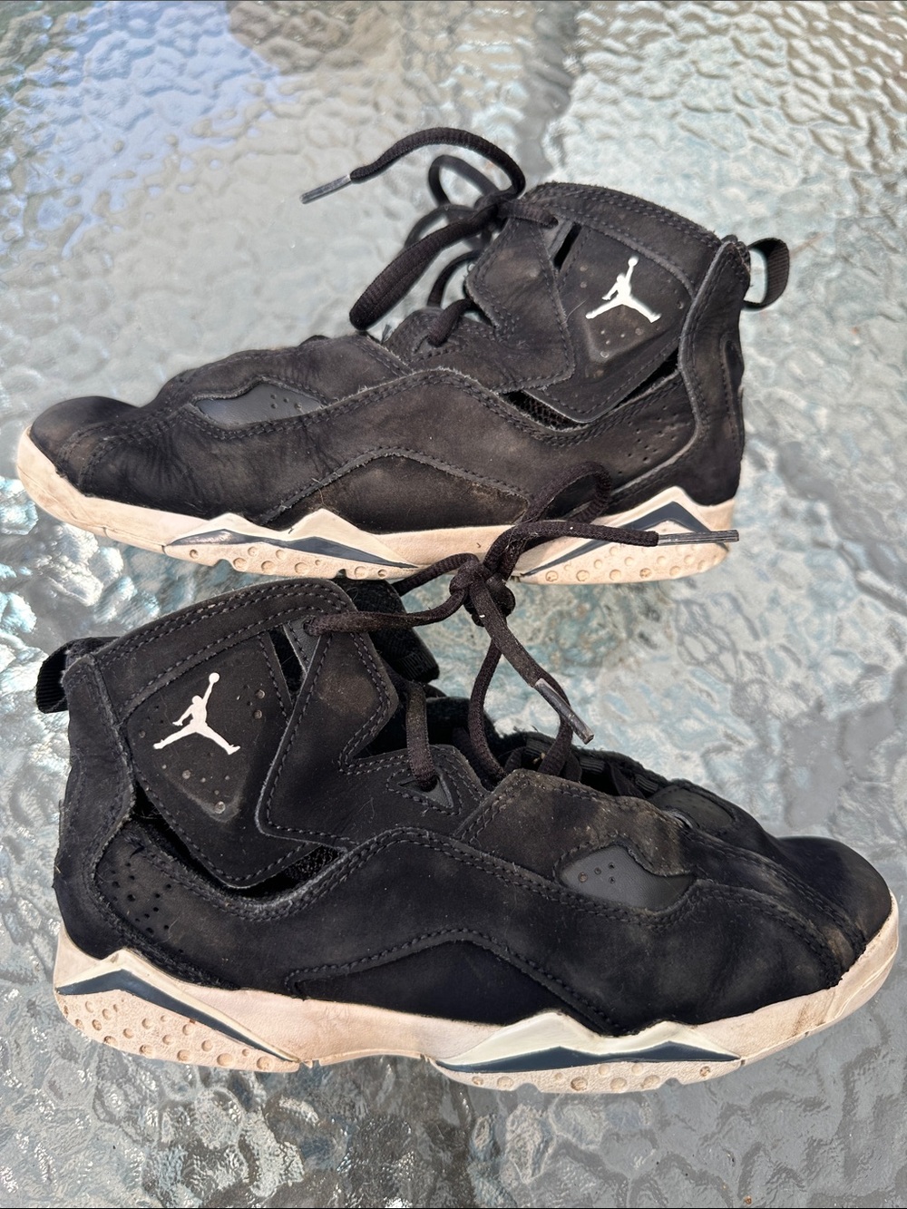 Jordan Kids Black and White High-Top Sneakers with Jumpman